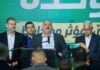 Pemimpin partai Ra'am Mansour Abbas (tengah) dan anggota partai di markas partai di Tamra, Israel, pada malam pemilihan, 23 Maret 2021. (Flash90/Times of Israel)