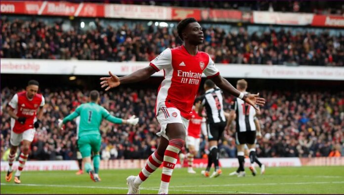 Pemain muda Arsenal Bukayo Saka membuka skor dalam kemenangan 2-0 atas Newcastle Ubnited di Stadion Emirates, Sabtu (27/11/2021). Dia didapuk sebagai King of the Match pada laga ini. (Foto: Premierleague.com)