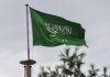 Ilustrasi bendera Arab Saudi (Foto: AFP/OZAN KOSE)